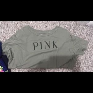 The green PINK shirt is a Medium and the PINK crop top/long sleeve is a Small!